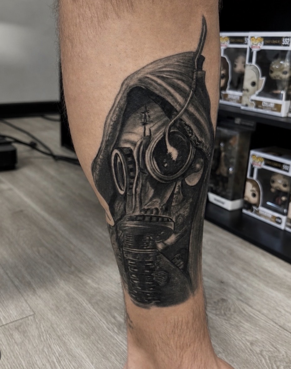 Gas mask realism tattoo by Jake Bebout at Snafu Tattoo Studio in Wilmington NC