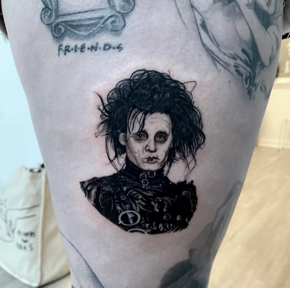 Character portrait tattoo by Jake Bebout at Snafu Tattoo Studio in Wilmington NC